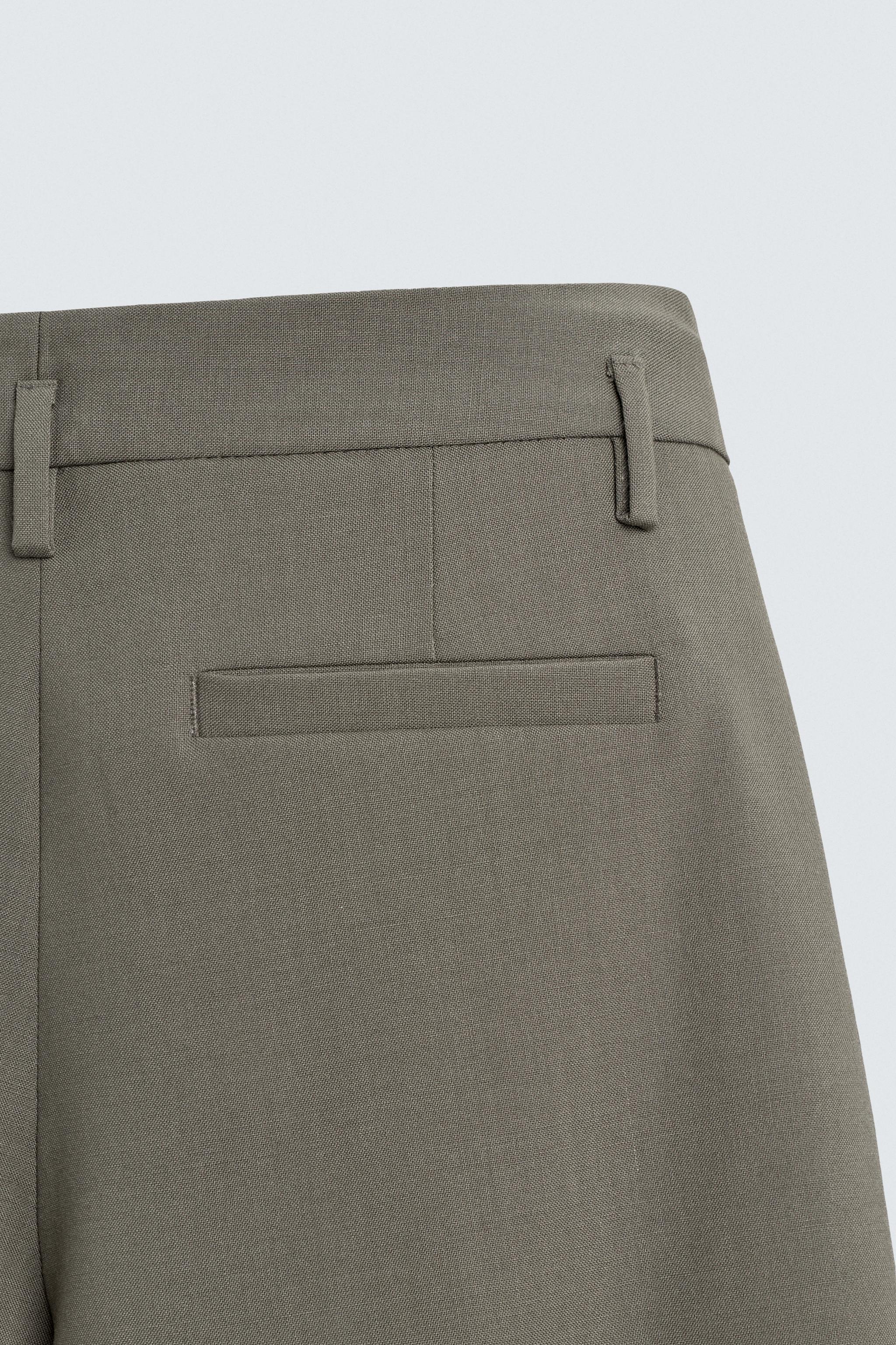 100% WOOL PLEATED SHORTS